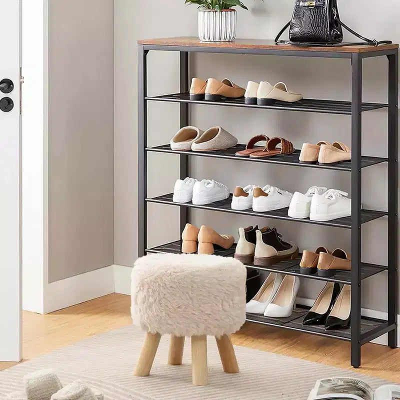 Poggiapiedi rotondo pouf in ecopelle imbottito con seduta imbottita bianco